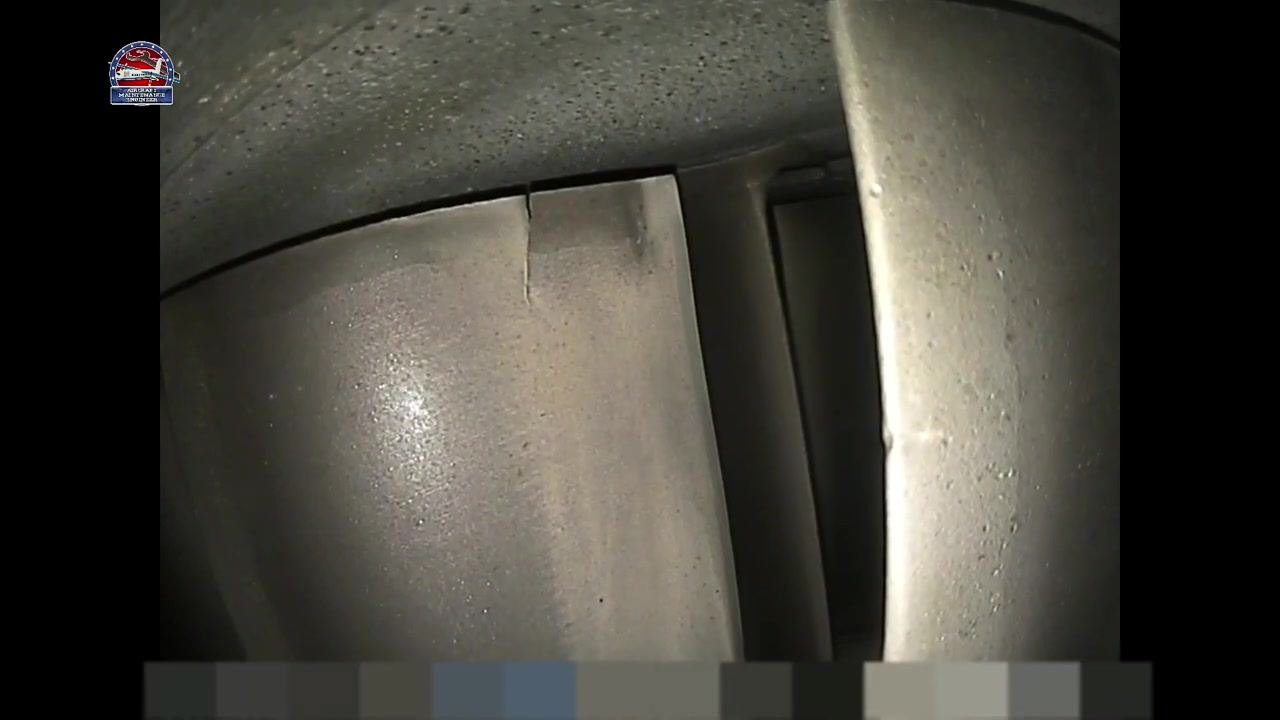 Turbine blade with a small surface crack or indentation near the top edge