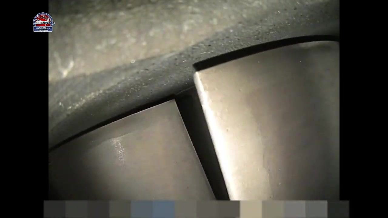 Two adjacent turbine blades re-examined from a slightly different angle, showing no defects