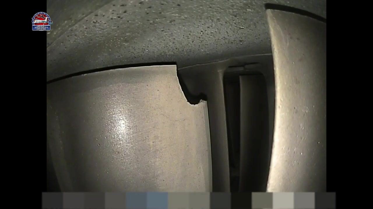 Turbine blade with the large chip or missing section remaining clearly visible