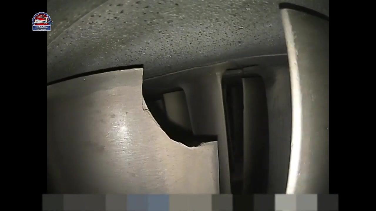 Turbine blade damage shown in full extent from a wider angle