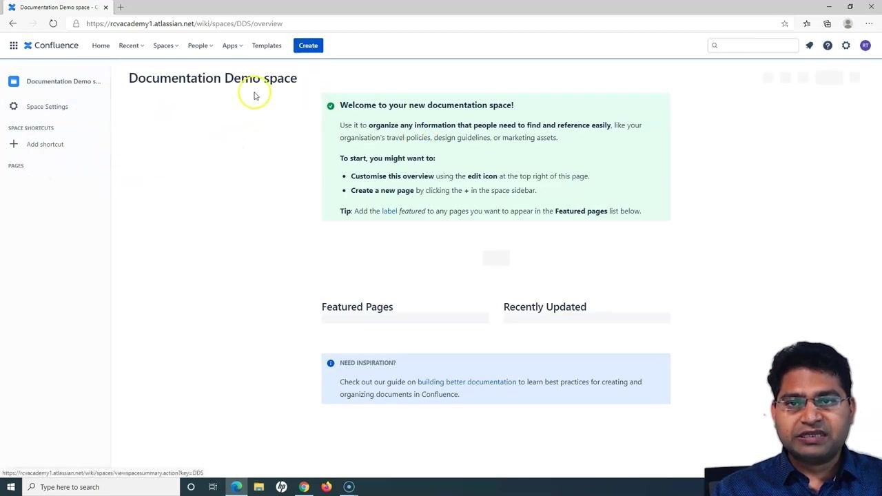 Confluence documentation space overview with welcome message, empty featured/recently updated sections, and sidebar