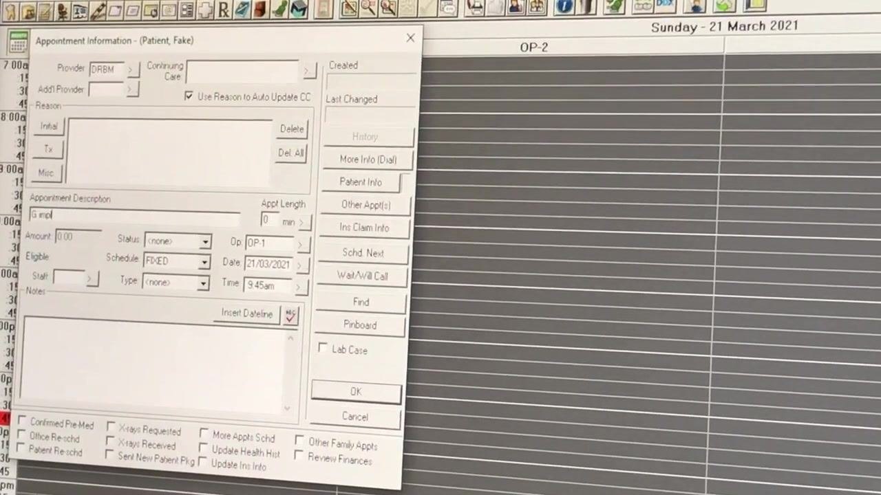Appointment Information window for patient "Fake" with "G implant" in the description, provider DRBM, operatory OP-1, date 21/03/2021, and time 9:45am