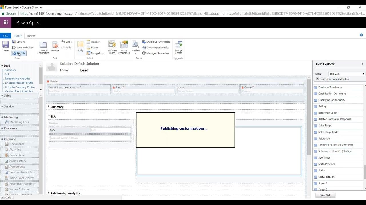 PowerApps form editor showing the Lead form with a "Publishing customizations..." dialog overlay. The SLA section contains the SLA lookup, Quick View Form, and subgrid.