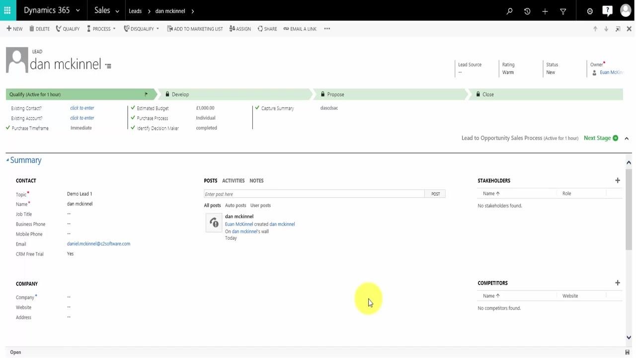 Dynamics 365 Lead to Opportunity business process flow showing stages, contact summary, and the CRM Free Trial field