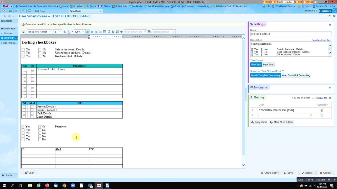 New table inserted at the bottom of the SmartPhrase template, ready for resizing and editing.
