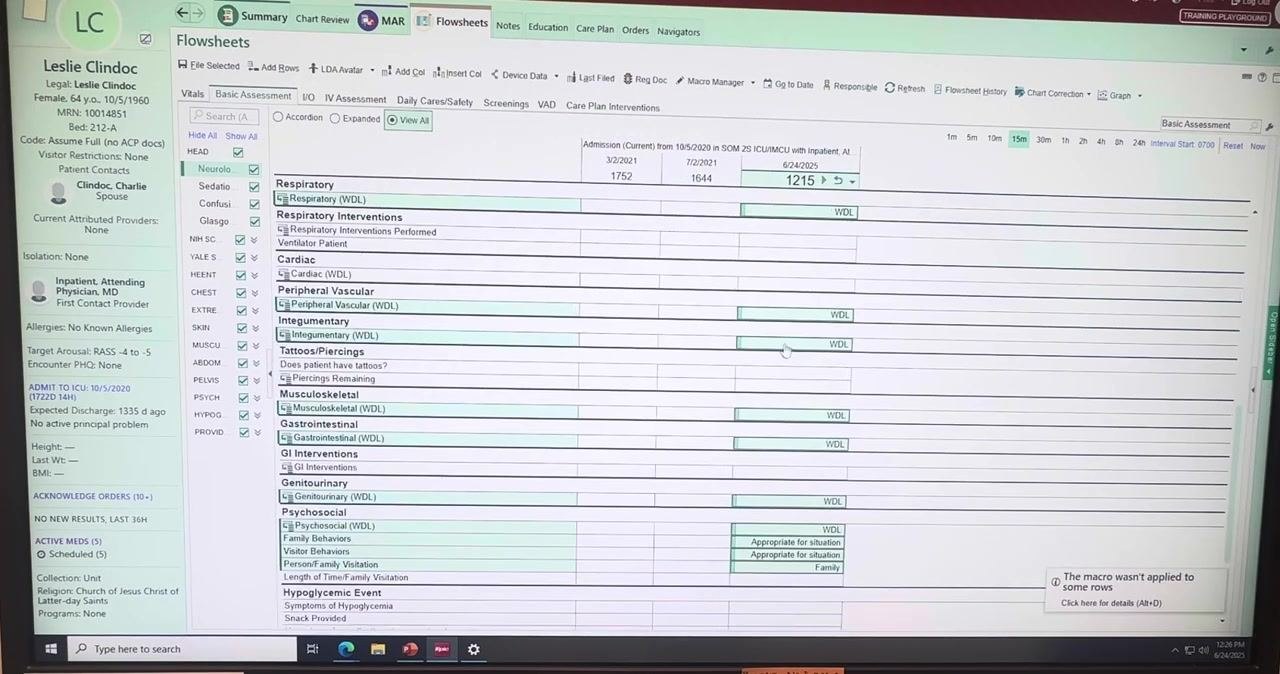 Epic Flowsheets screen showing all assessment fields populated by the macro, with the Respiratory section highlighted for review