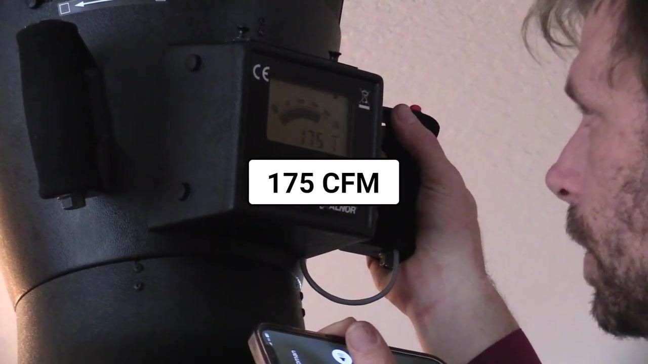 Close-up of the flow hood display showing a reading of 184 CFM.