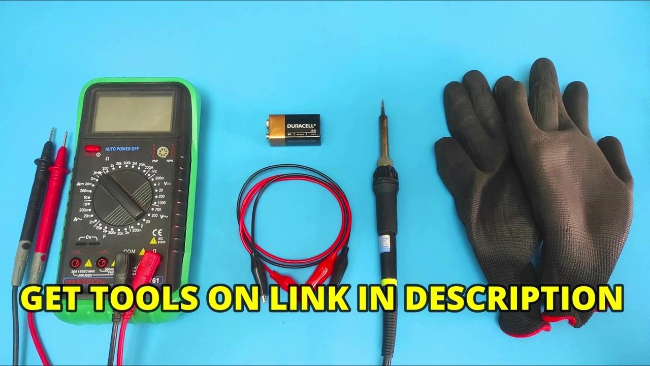 A set of tools laid out on a blue surface: digital multimeter with probes, a 9V battery, red and black jumper wires with alligator clips, a soldering iron, and protective gloves.
