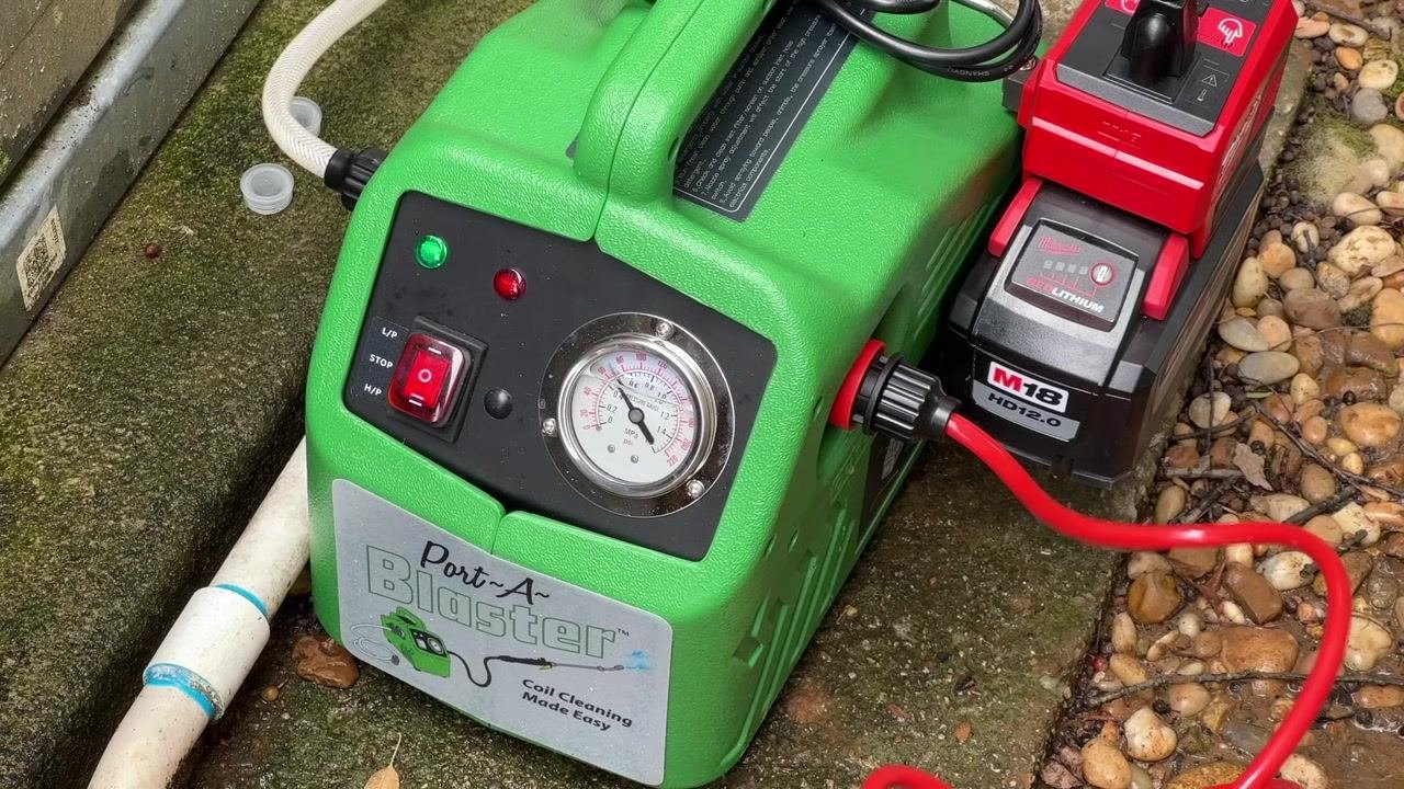 A close-up of the Port-A-Blaster coil cleaning machine shows the gauge, indicator lights, and power switch settings.
