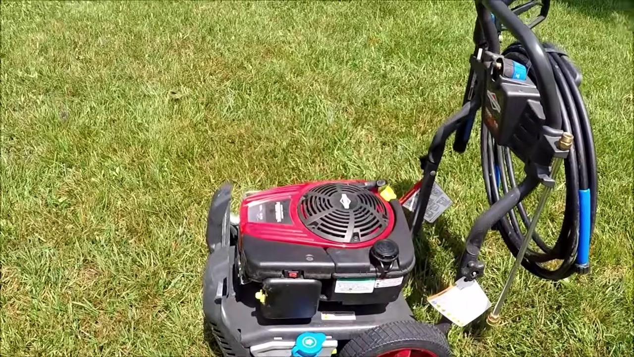 Top view of the engine and starter cord, showing the pressure washer in a ready-to-start position.