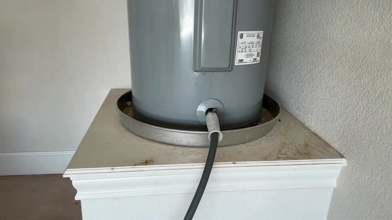 Person demonstrating how to restore flow by briefly turning the cold water supply valve back on