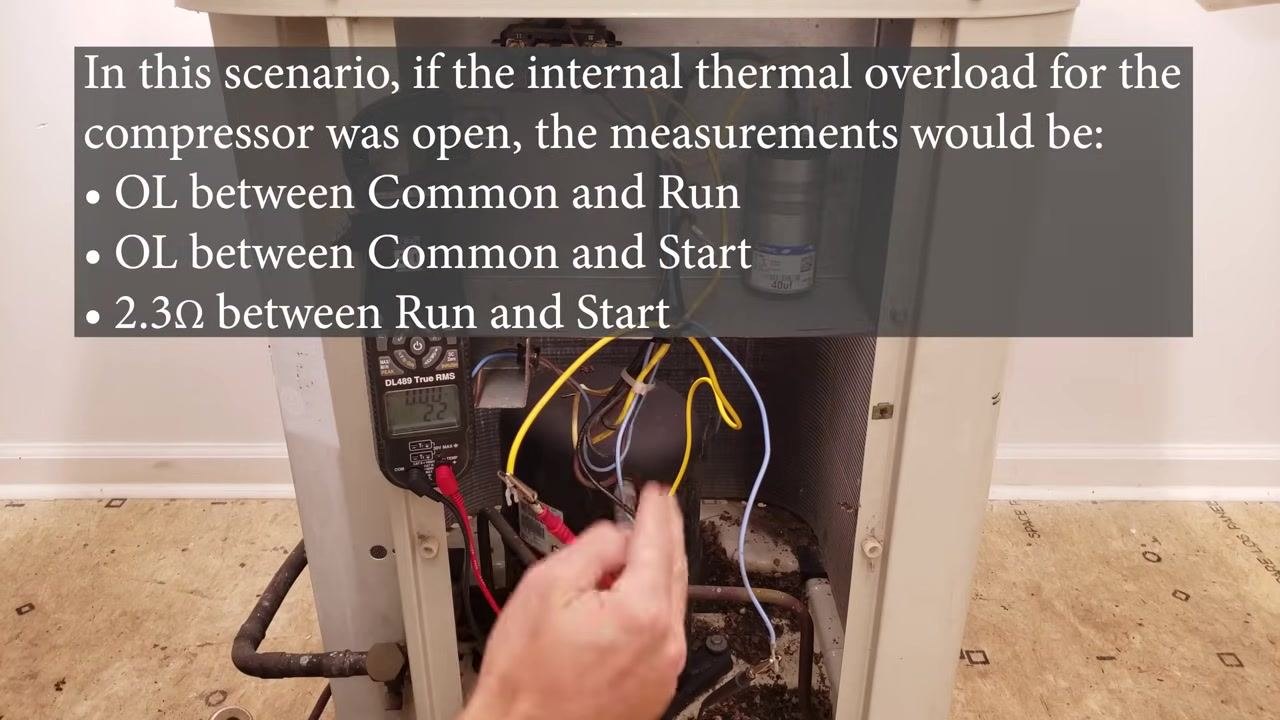 Technician measuring compressor terminals with a multimeter, with on-screen text describing the OL readings expected when the internal thermal overload is open