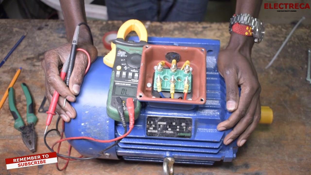 Multimeter probes positioned between a winding terminal and the motor body, with the display showing "OL" (open loop), indicating no ground leakage, and the winding diagram overlaid for reference.