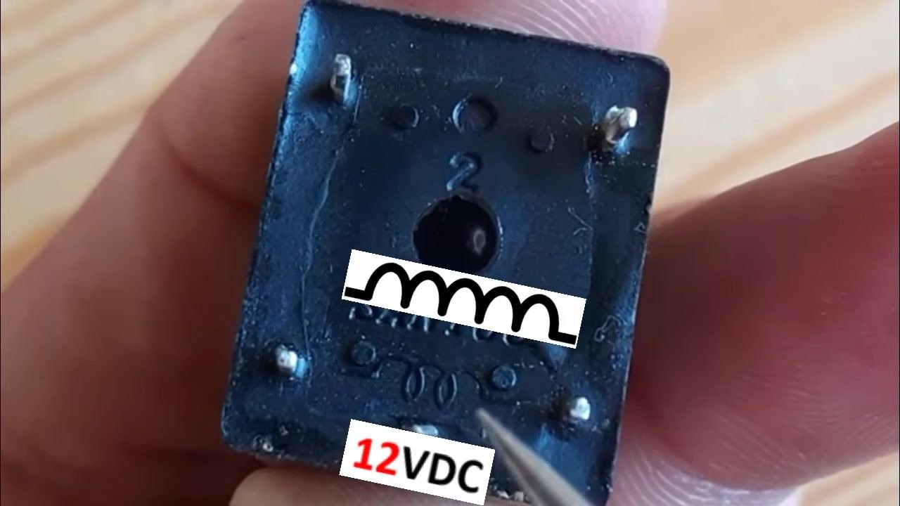 Close-up of a HUAWEI power adapter label showing model, input (100-240V~), and output (12V 1A) specifications