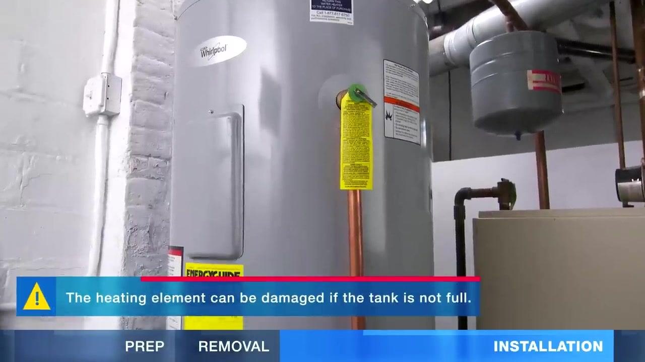 A water heater installed in a utility room with copper pipes connected, a yellow warning tag, and an EnergyGuide label visible.