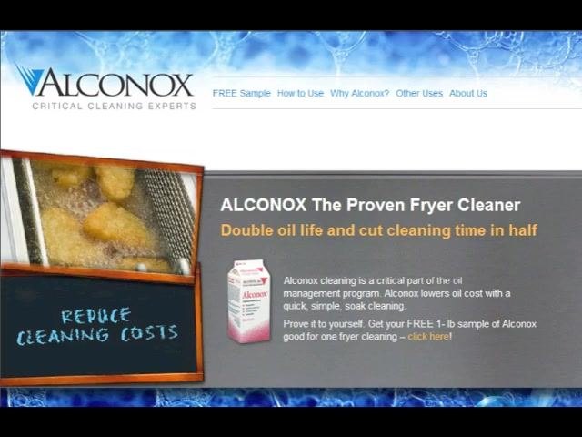 A fryer with visible carbon buildup and a box of Alconox detergent powder. On-screen text reads: "Use Alconox® Detergent Powder for Heavy Carbon Build-Up."