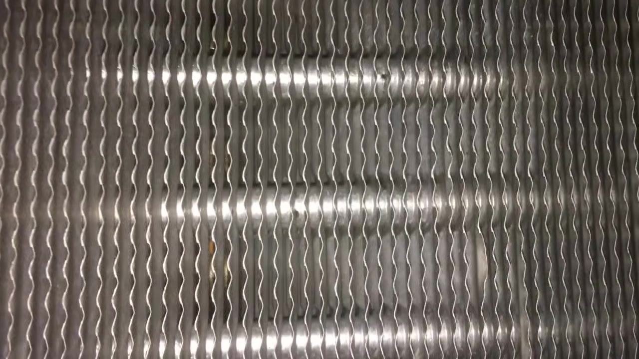 HVAC coil and white frame viewed from a different angle