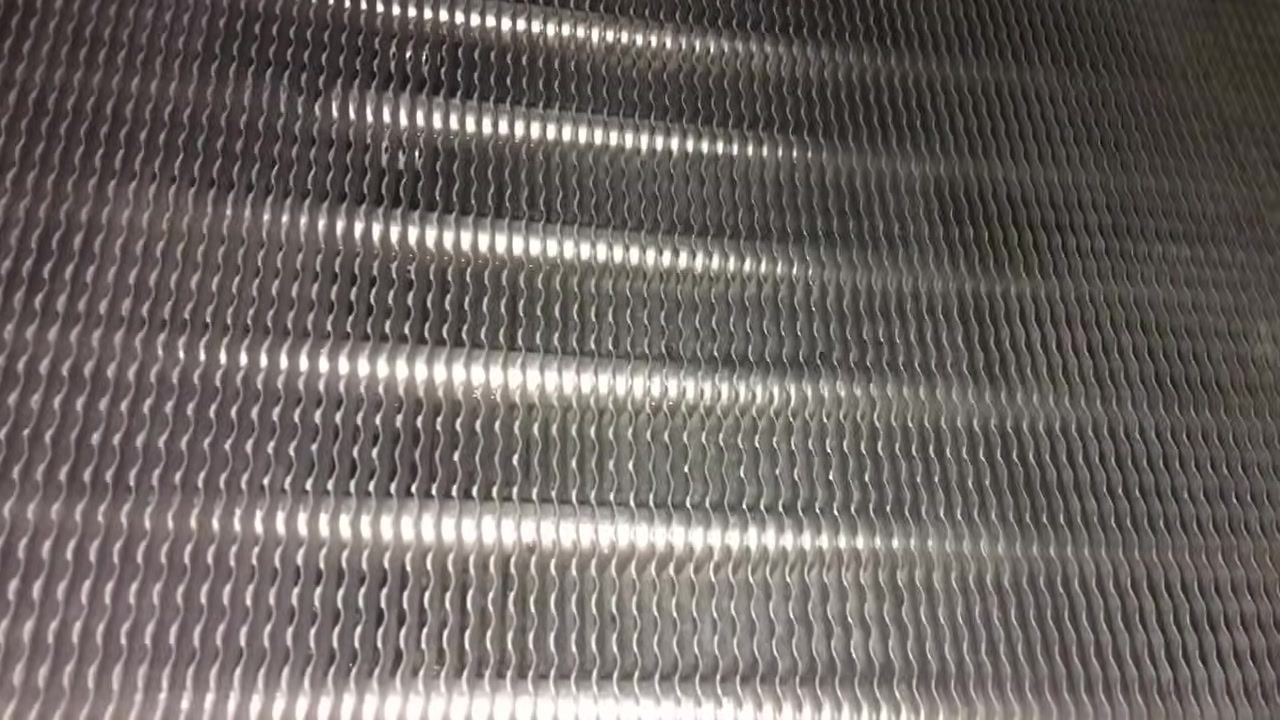 View of the evaporator pan drain connection showing a slip coupling and no union fitting