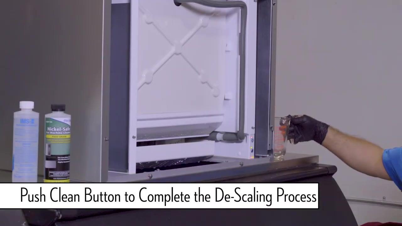 Technician removing the top cover again in preparation for the sanitizing process.