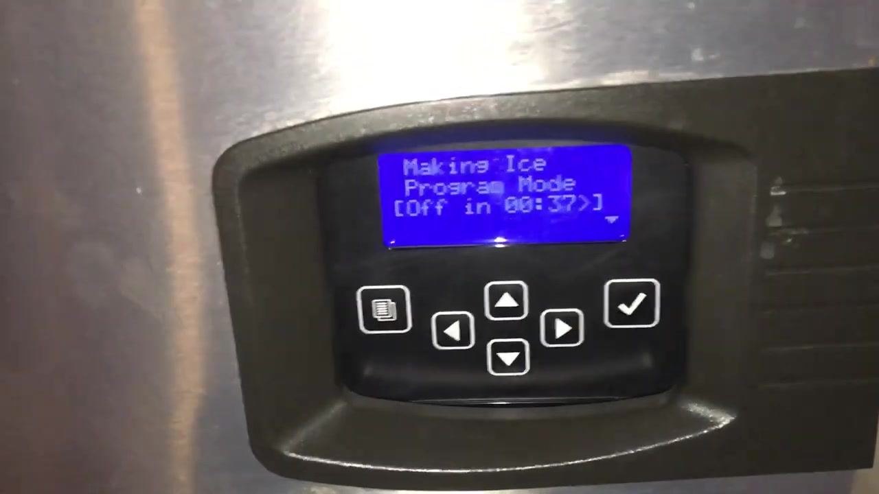 Ice machine display showing "Making Ice, Program Mode, Off in 00:37" with navigation buttons below
