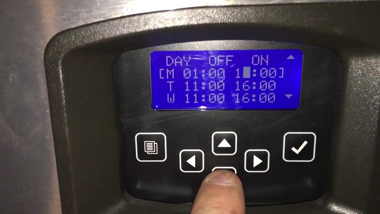 Display showing "Time Prog (✓)" while navigating the menu to verify settings
