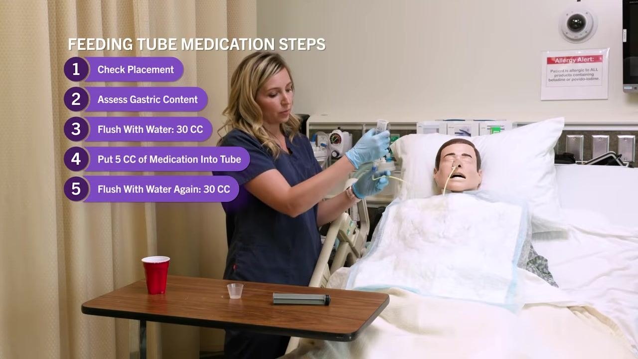 Nurse demonstrating drawing up fluid with the plunger in the syringe, with on-screen steps 1 through 5 displayed.