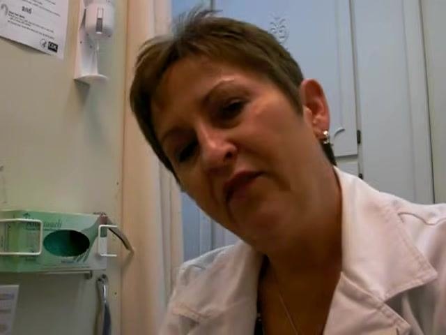 Instructor in a clinical setting, concluding the demonstration and thanking the viewer. Medical supplies and informational posters are visible in the background.