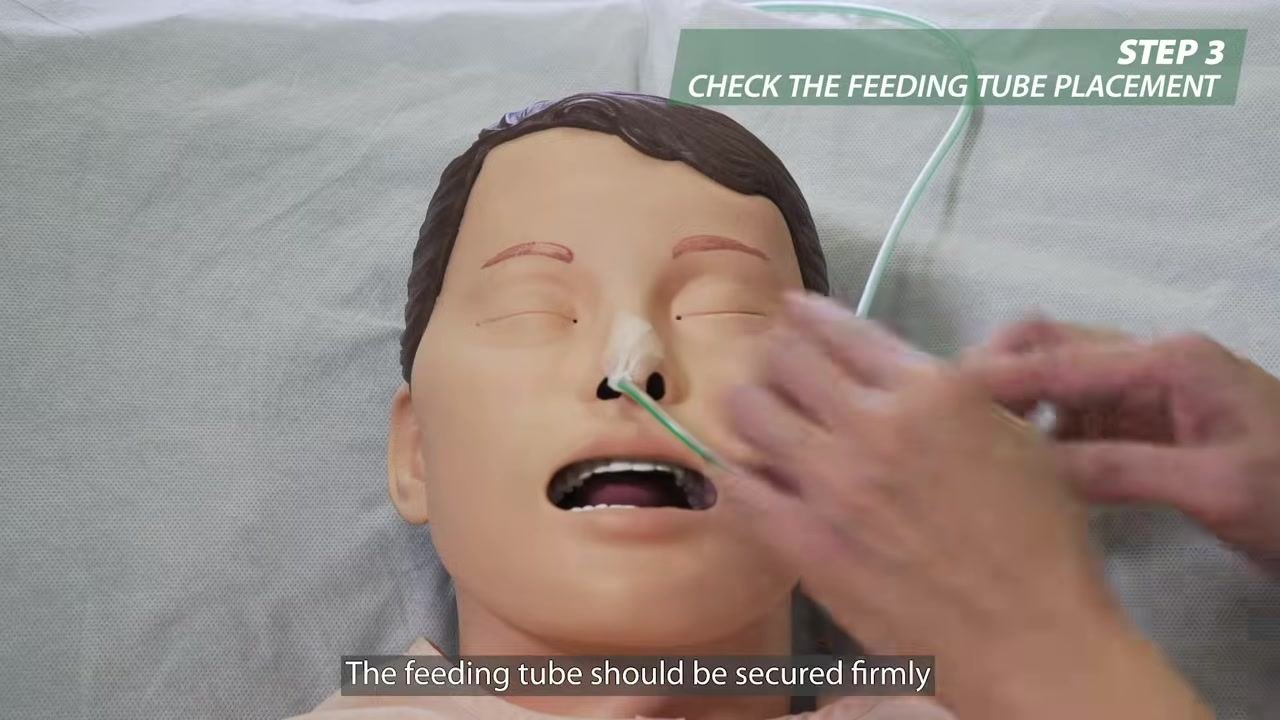 A nurse turning a patient onto their left side in bed
