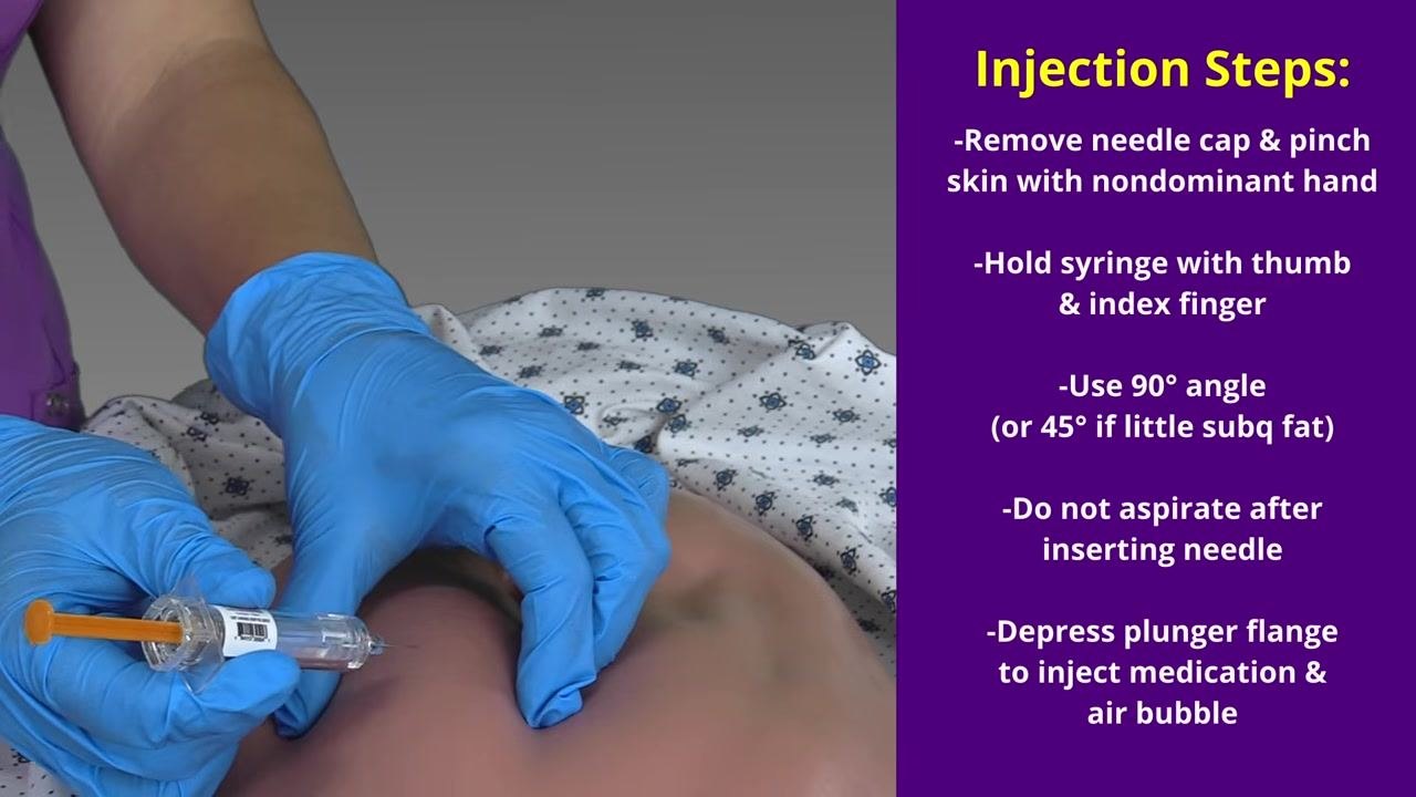 Gloved hands inserting the needle at a 90-degree angle into the pinched abdominal skinfold.
