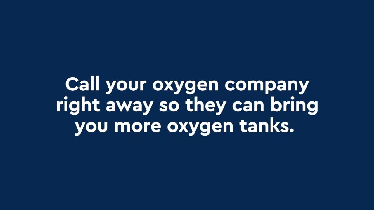 An oxygen tank in a black carrier is left unsecured on the back seat of a car, with a large blue "X" over the image indicating this is not safe storage.