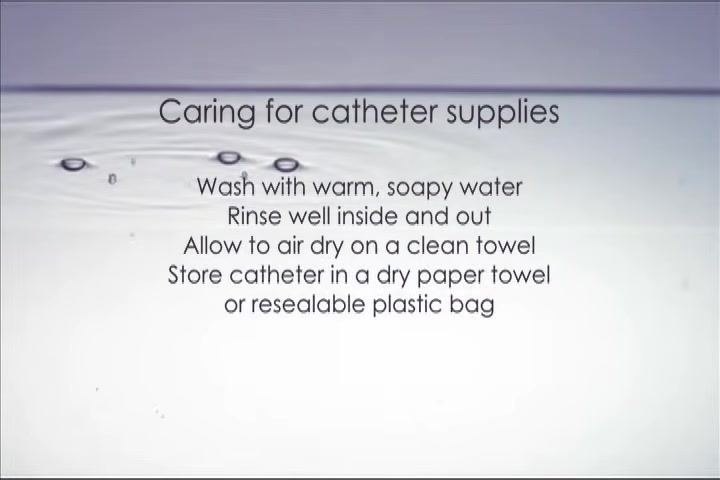 Slowly removing the catheter, with the collection container below