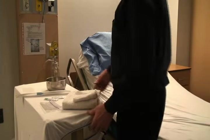 Washing hands at a sink under running water