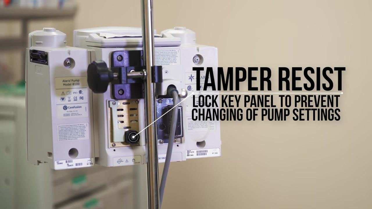 A gloved hand presses the START button while the screen prompts to verify the secondary clamp is open.