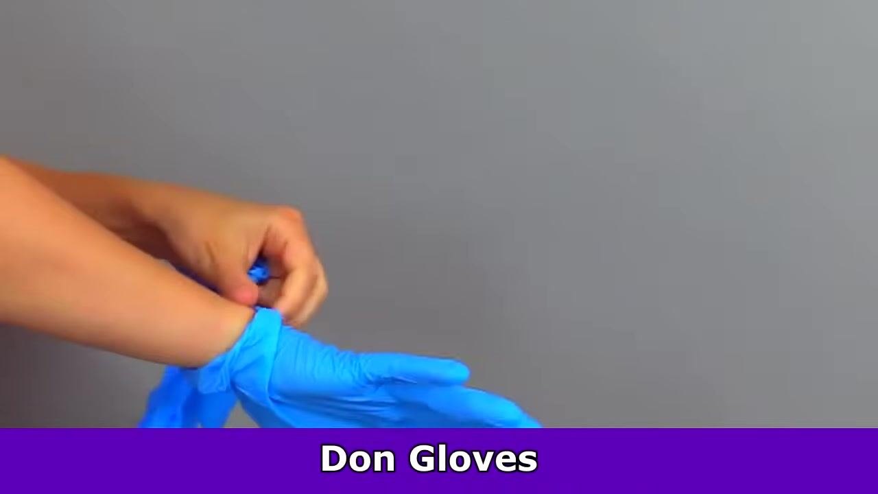 Gloved hands connecting the 10 mL syringe to the green balloon port, preparing for passive deflation