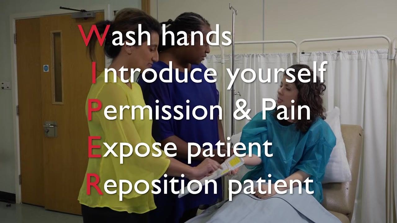Two staff members, one in yellow and one in blue, interacting with a patient in a blue gown. The overlay text reads "Wash hands, Introduce yourself".