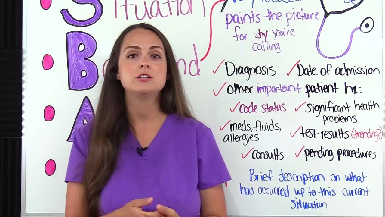 Nurse in purple scrubs stands by the whiteboard, referencing the list of background items and emphasizing the importance of reviewing previous test results.
