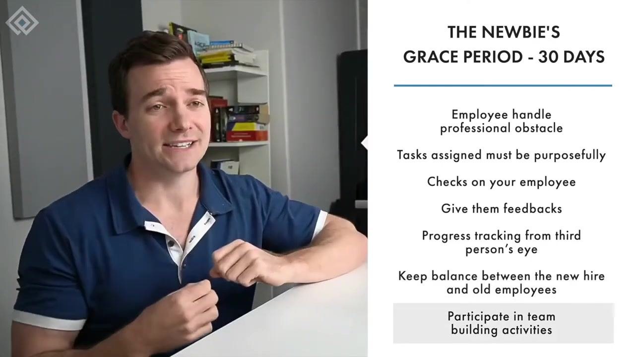Presenter at desk, HR UNIVERSITY logo on monitor, discussing boosting goals during the grace period