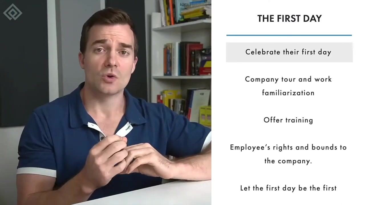 Slide listing desk organization, reassessing employee requirements, and company-branded material, framed around keeping the first day simple and effective.