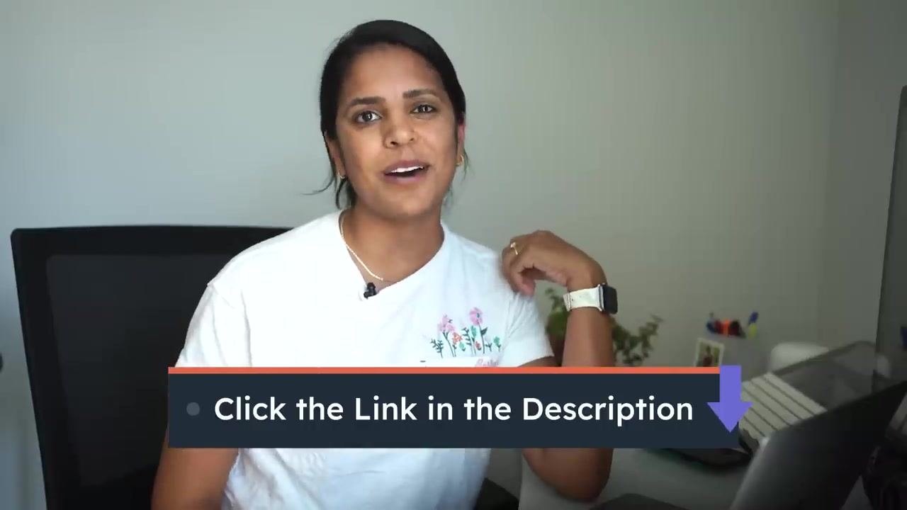 Presenter seated at a desk, smiling, with overlay text: 'Click the Link in the Description'