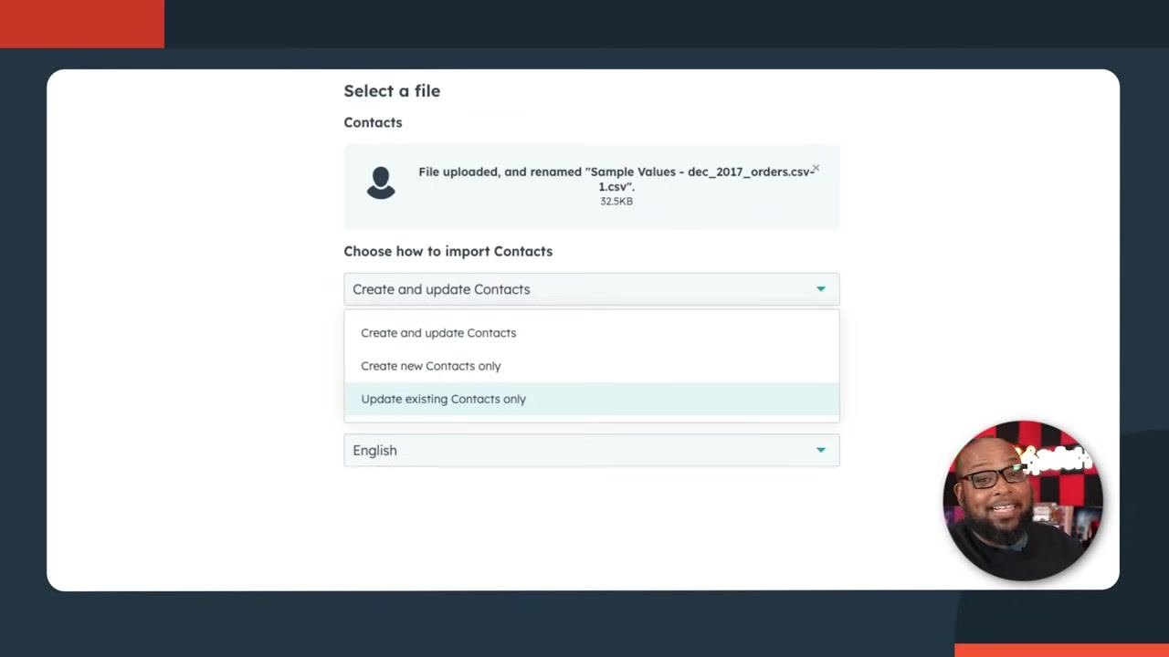 Screen showing the file upload interface in HubSpot with the file "Sample Values - dec_2017_orders.csv" uploaded, the "Update existing Contacts only" option selected in the dropdown, and the language set to English. A presenter is visible in the lower right corner.