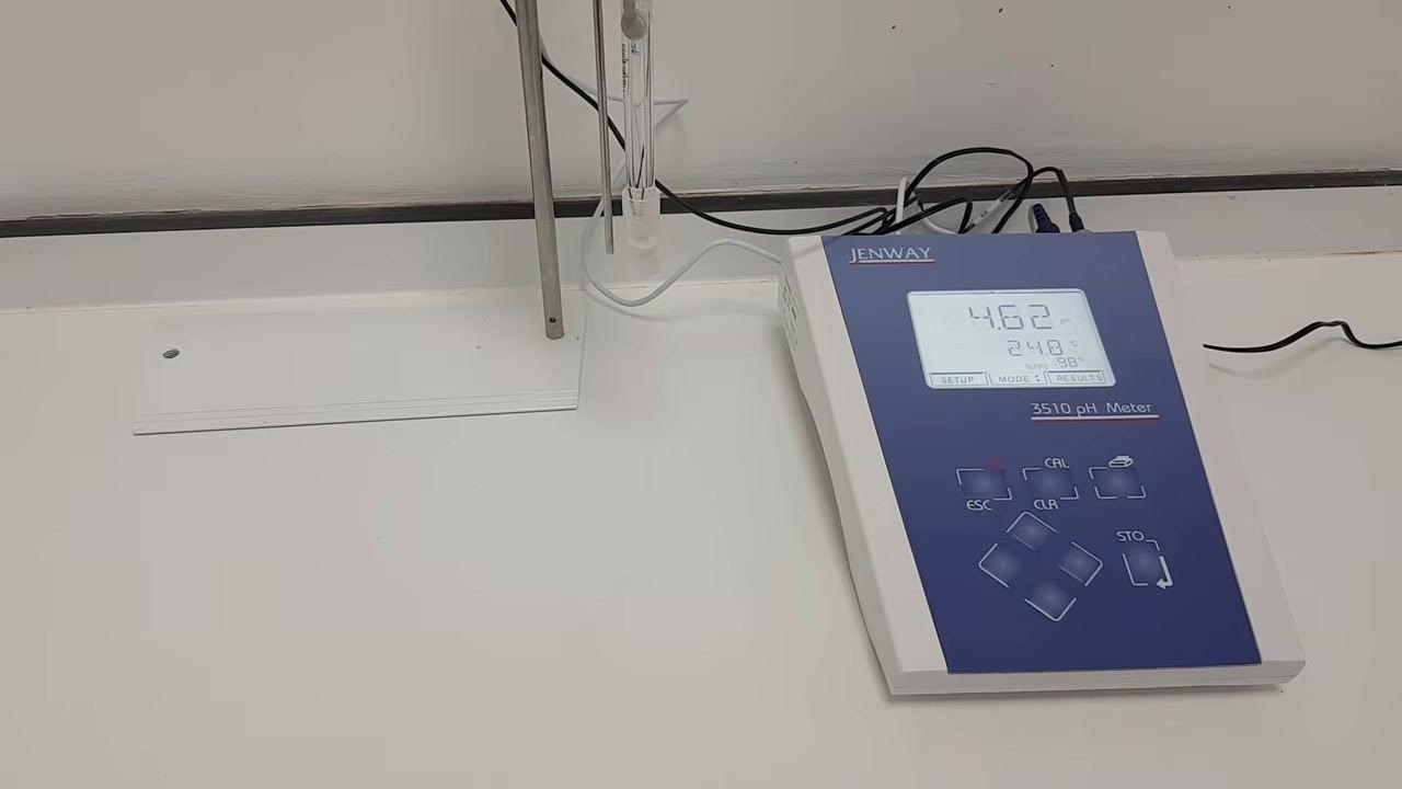 Jenway 3510 pH meter and probe on a clean lab bench; the probe is capped and stored upright, meter display reads 4.62 pH, 24.8°C. The tidy workspace confirms the procedure is complete