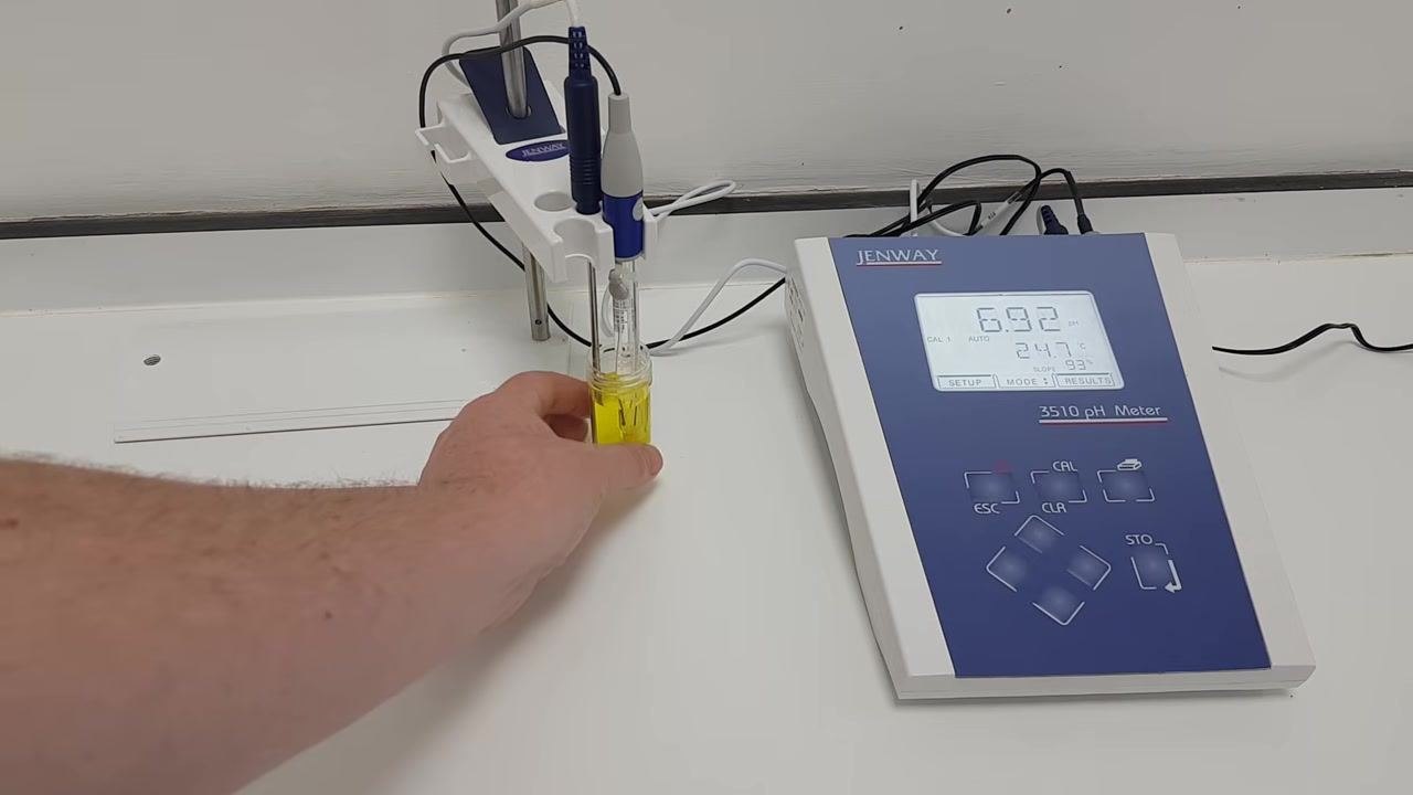 Hand gently swirling the buffer solution to fully cover the probes and remove air bubbles