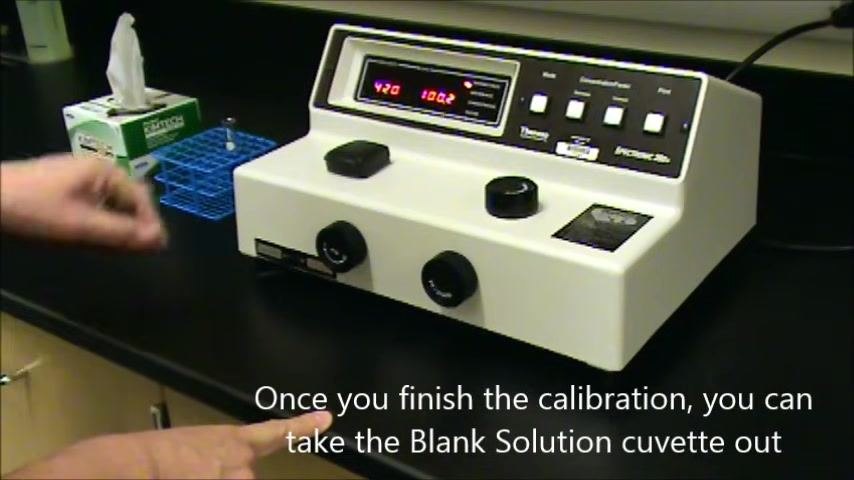 Close-up of the spectrophotometer display showing 420 nm and 93.0% transmittance