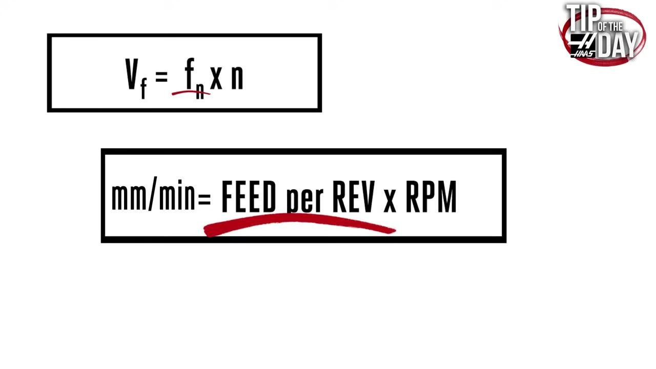 Workbench with a large drill and a standard end mill, used to illustrate feed per revolution versus feed per tooth.