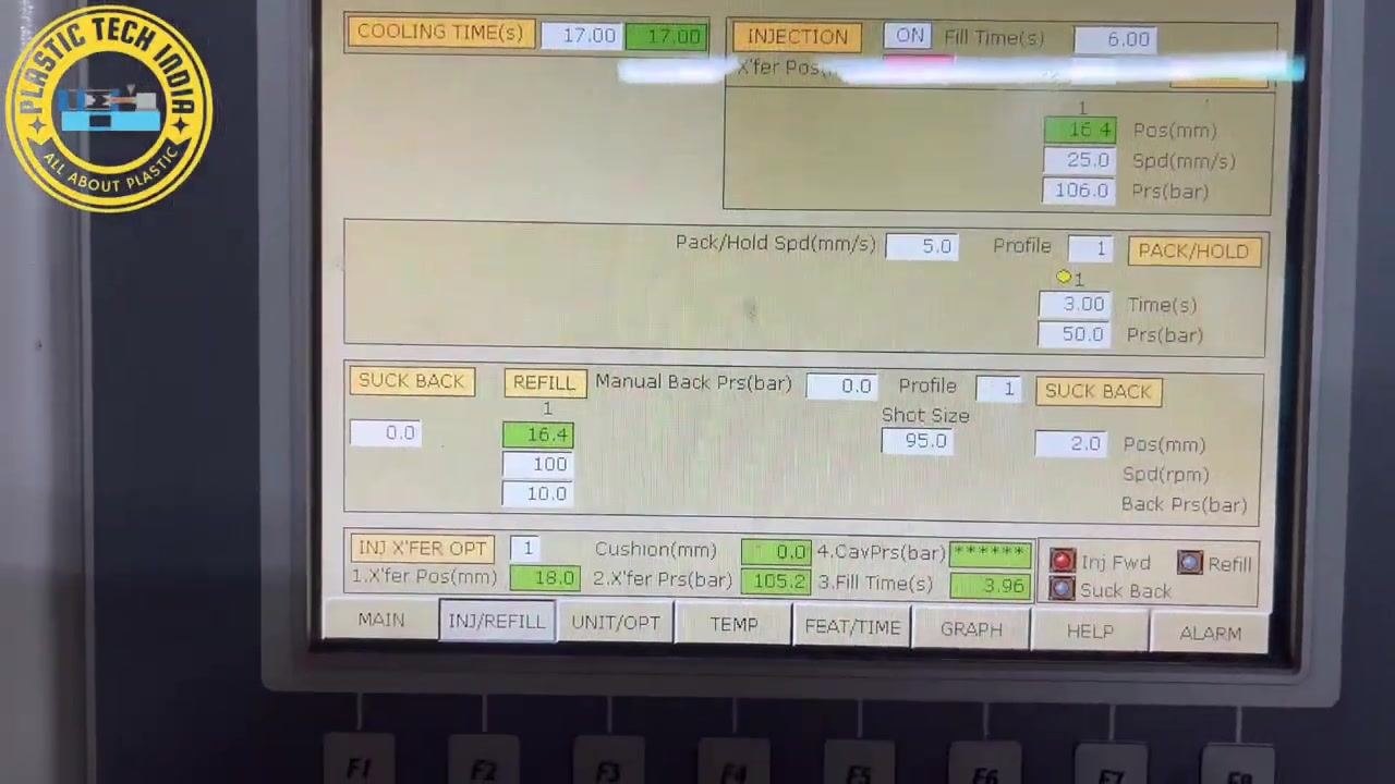 Wide view of the machine control panel showing all process parameters alongside part of the machine body.