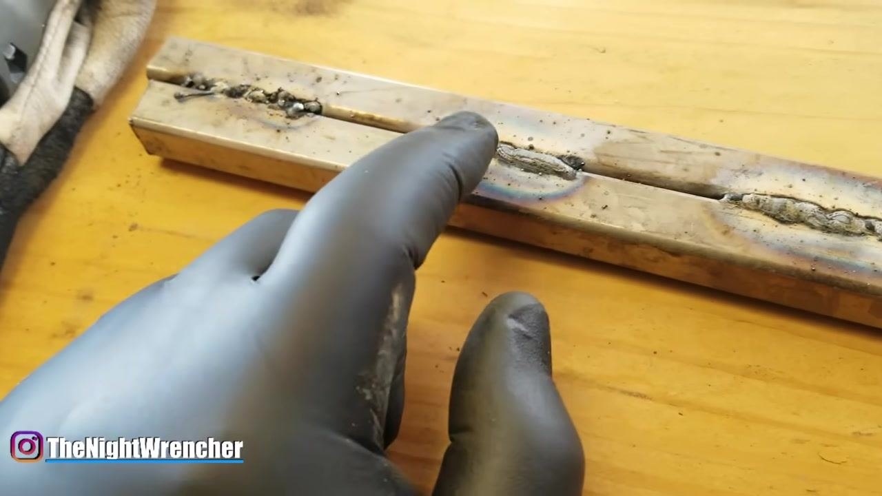A gloved hand points along the length of a weld bead, illustrating the importance of controlling welding speed for consistent results.