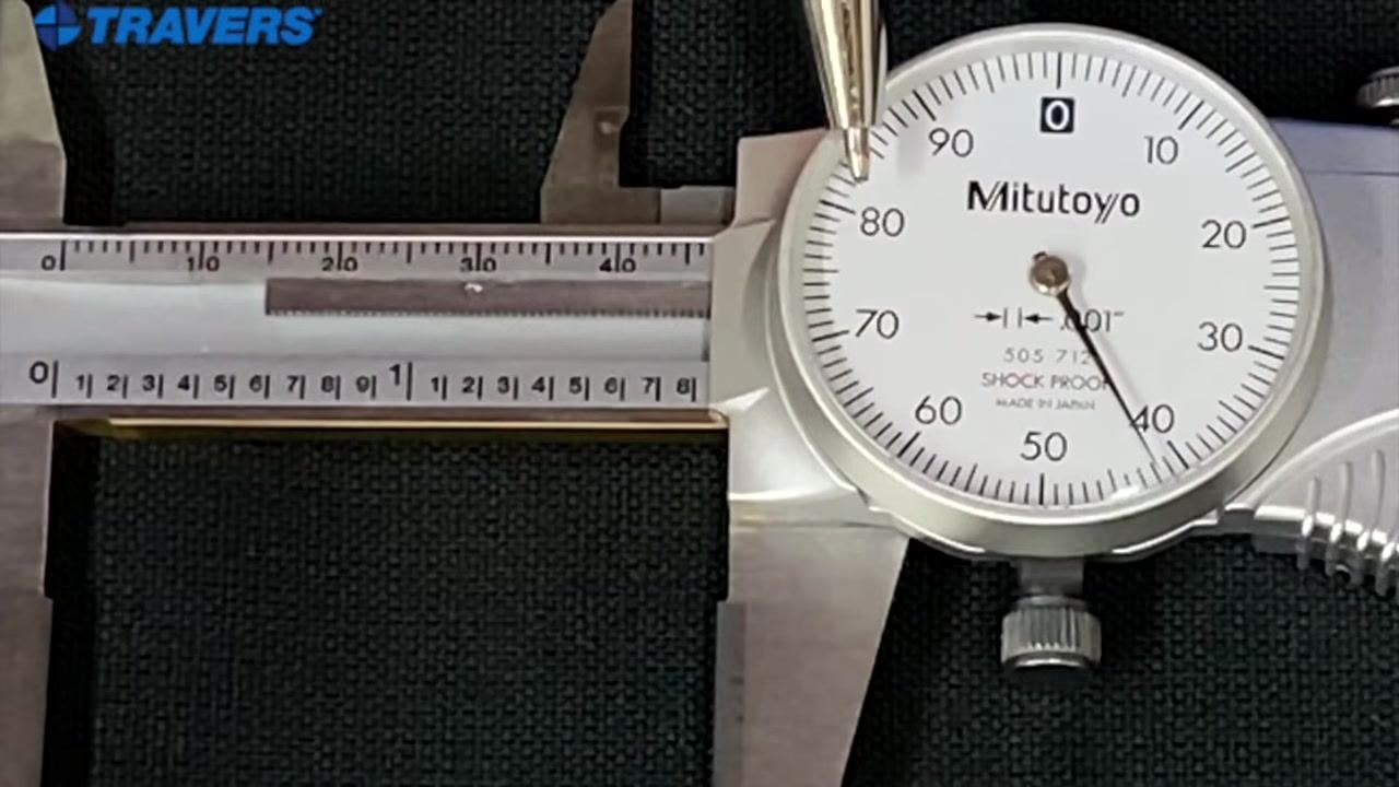 The dial pointer resting at 80, demonstrating a reading of eighty thousandths of an inch.