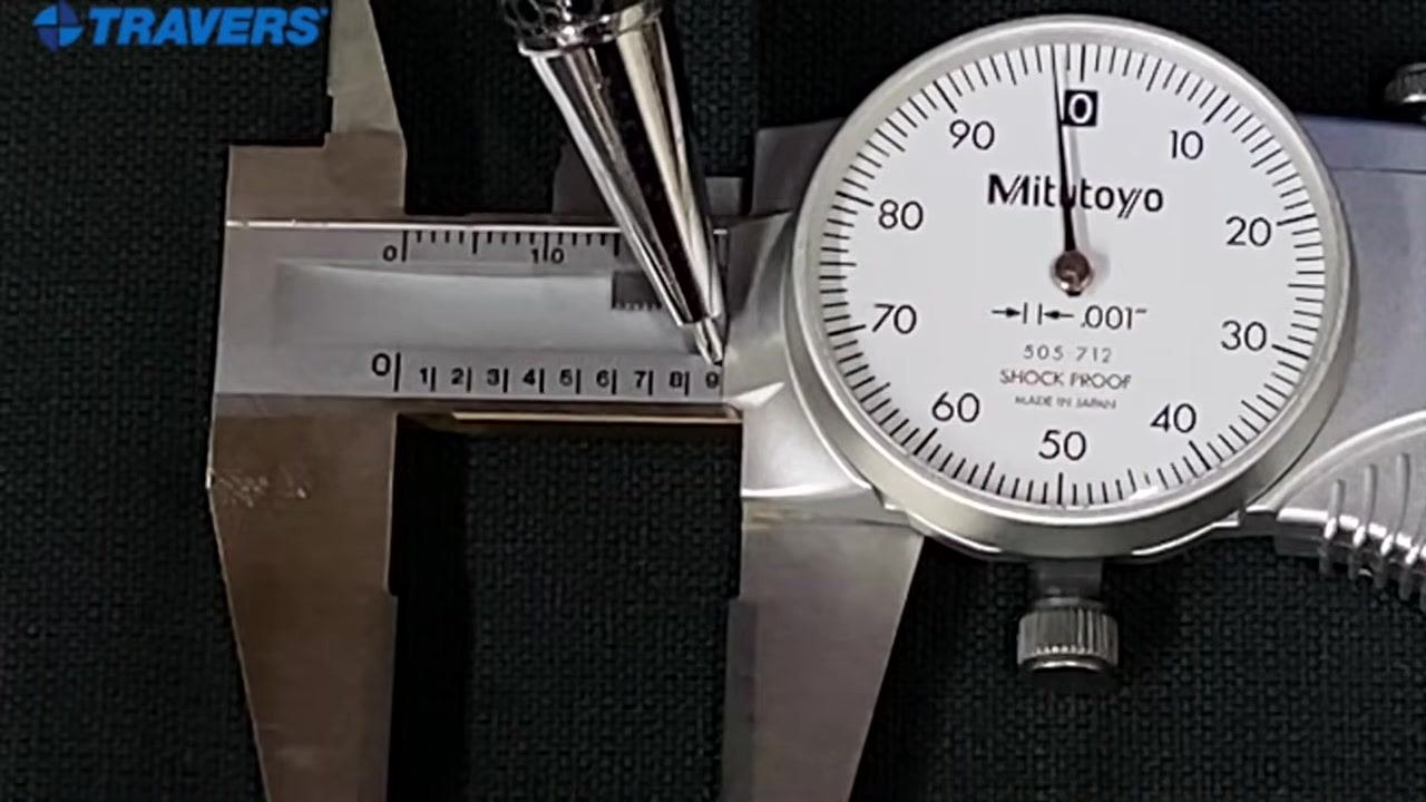 Pointer near the edge close to "9" on the main scale while the dial needle sits just before zero.