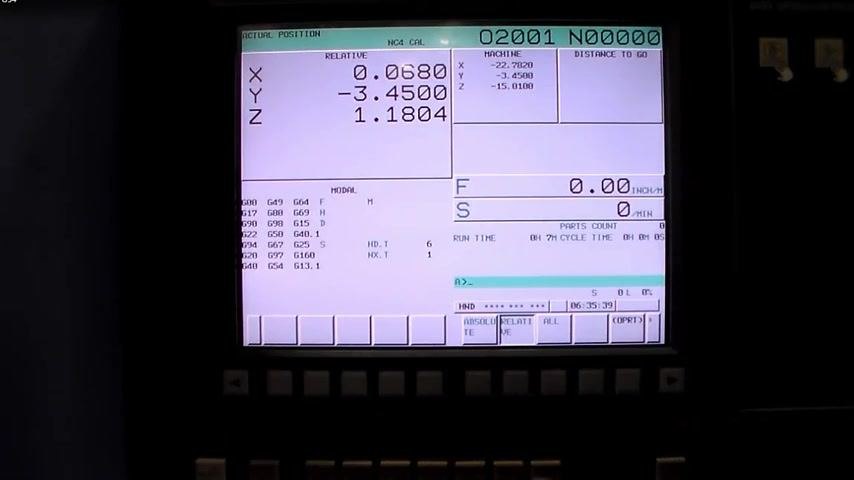 CNC control screen with X-axis selected and ready to be zeroed, showing axis values and function buttons