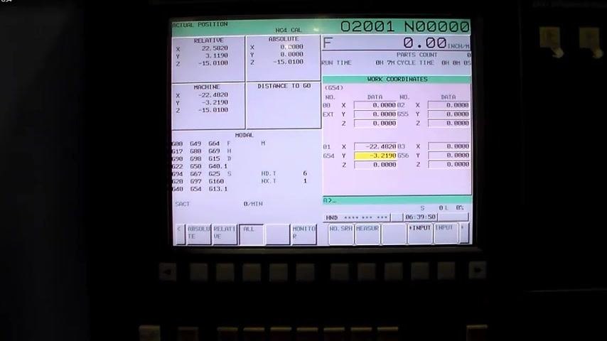 CNC control screen showing G54 Y field updated to -3.2190